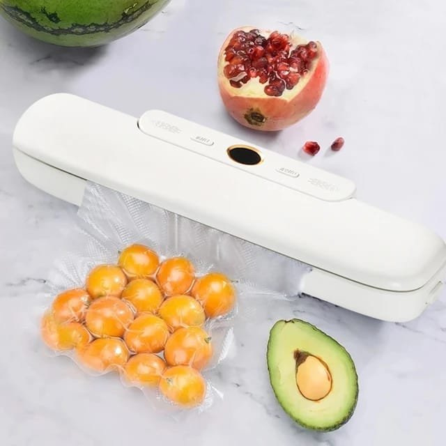 جهاز شفط وتفريغ الهواء بقوة 120 واط لحفظ الطعام و 10 أكياس تغليف إضافية .